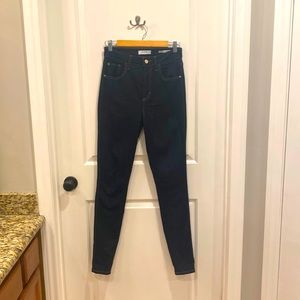 Guess super high rise, dark rinse wash skinny jeans
